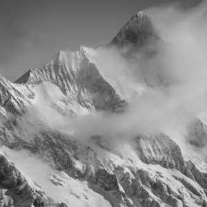 Schreckhorn - mountain scenery in mist and clouds - high mountain photo